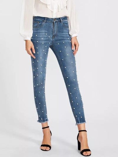 Jeans med hvite perler